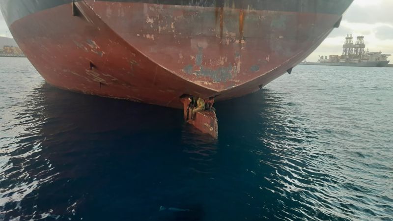 Read more about the article Three people found sitting on ship’s rudder survived an 11-day voyage from Nigeria | CNN
