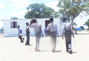 Read more about the article Pupils forced to carry water to school